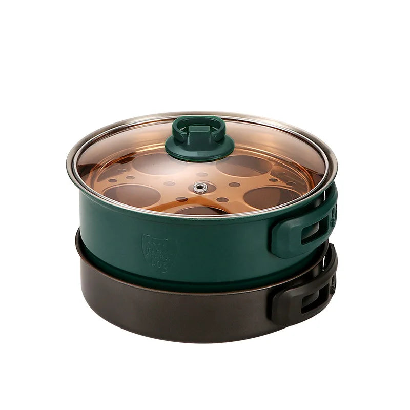 Teal portable electric cooker with clear glass lid and green knob
