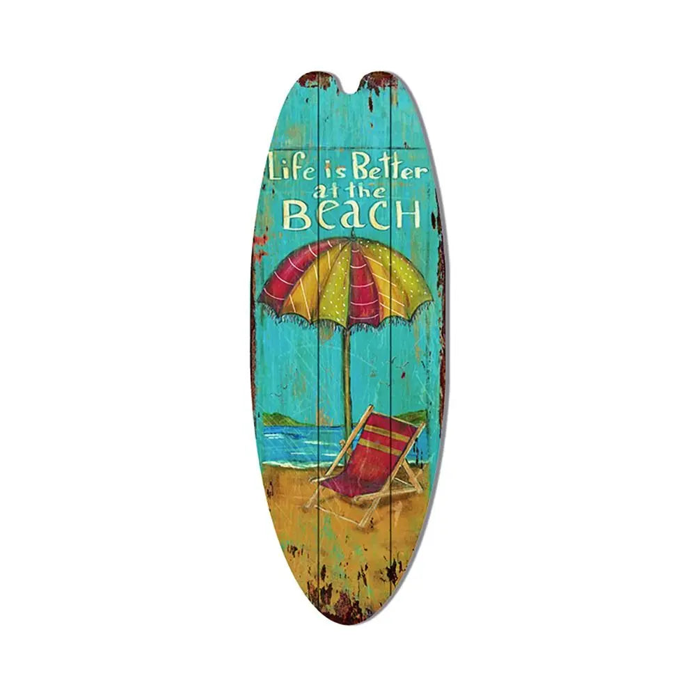 Wood surfboard hanging sign, teal and yellow with beach umbrella and “Life is Better at the Beach”