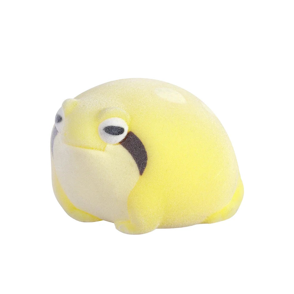 Cute yellow flocked rain frog soft squeeze toy, a kawaii collectible capsule figure for pet lovers and stress relief.
