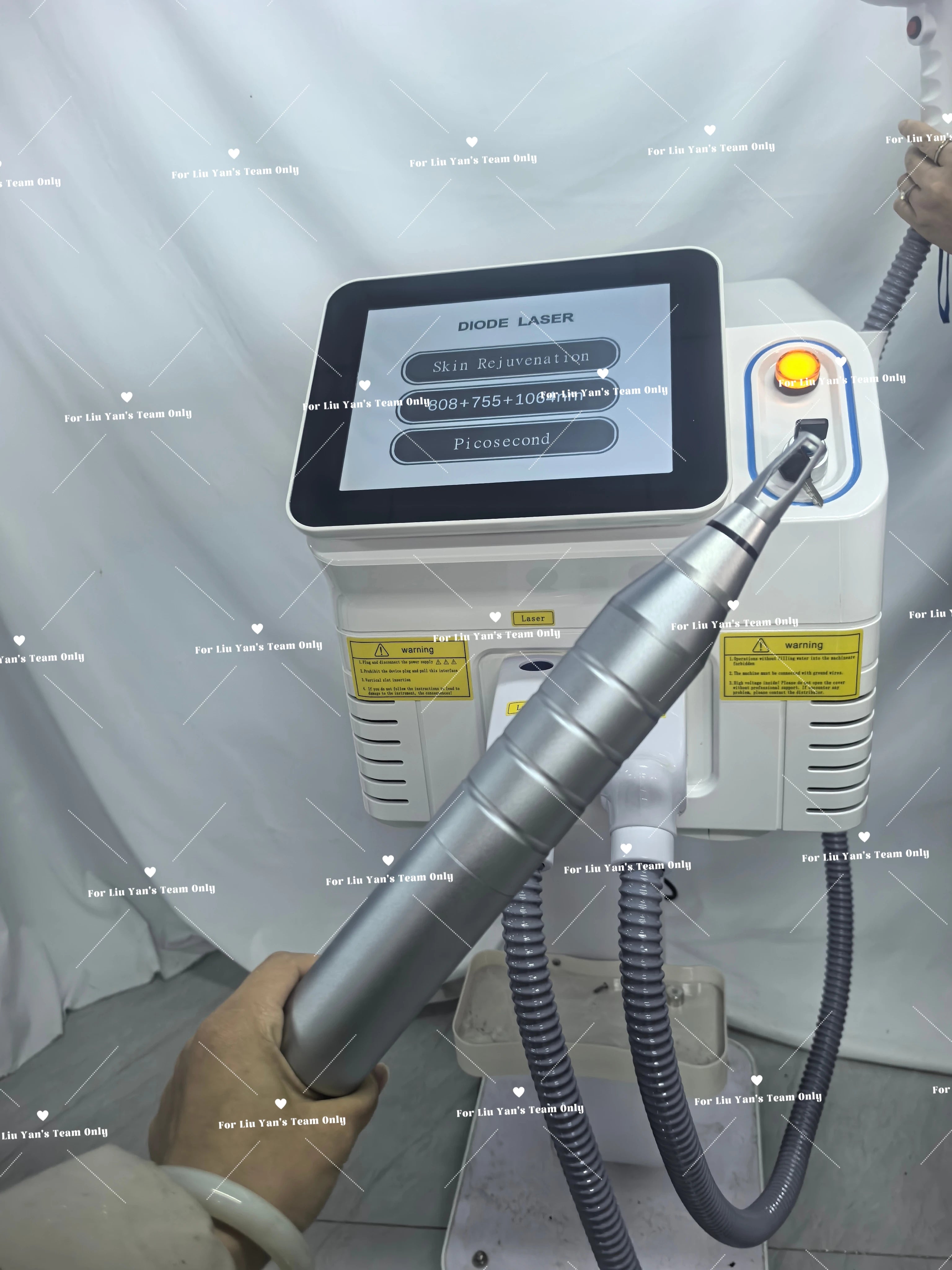 Tidesmit 2-in-1 Diode and Picosecond laser device showing laser heads for professional hair and tattoo removal.