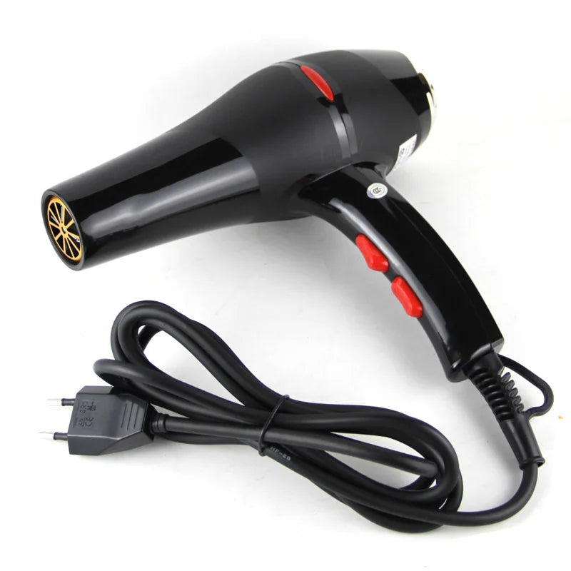 Professional 2100W black salon hair dryer with red control buttons and gold nozzle detail, fast-drying AC motor.