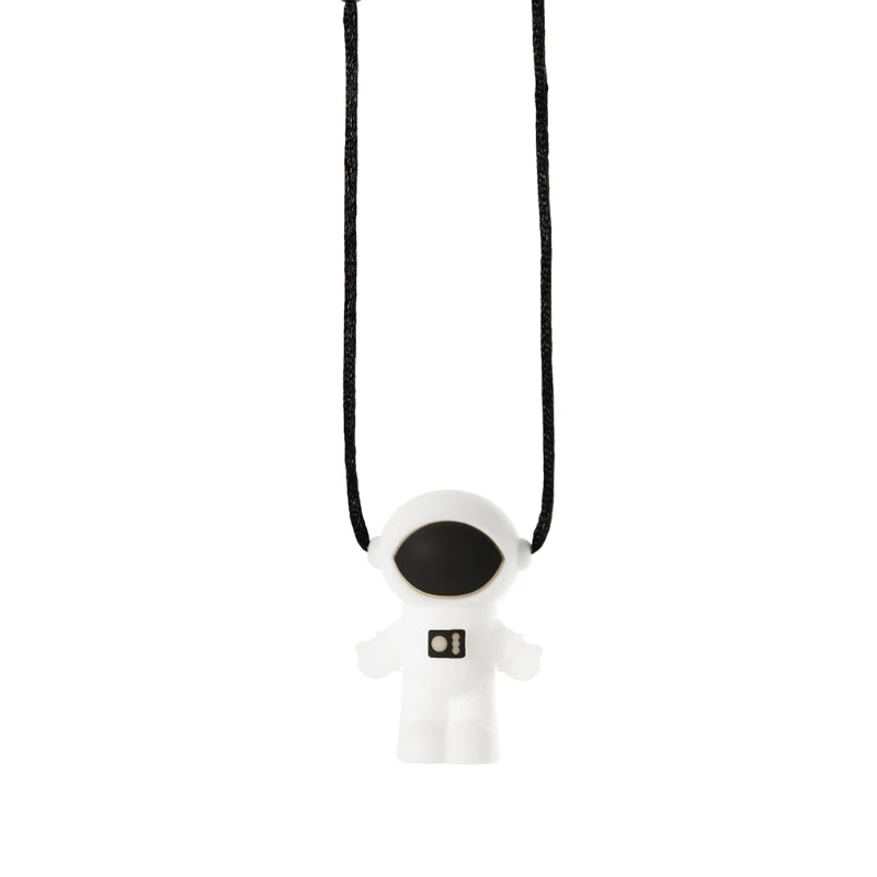 White silicone astronaut baby teething toy for relief.
