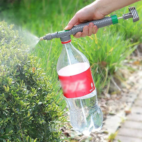 Adjustable bottle sprayer tool with grey ribbed handle and green spray head