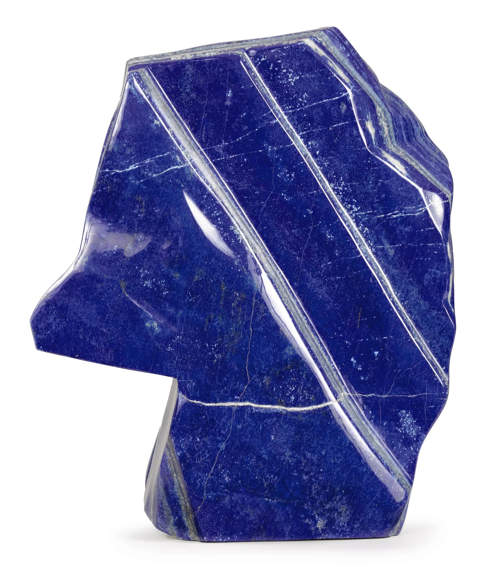 Polished blue lapis lazuli tumble, angular wedge shape with white mineral lines