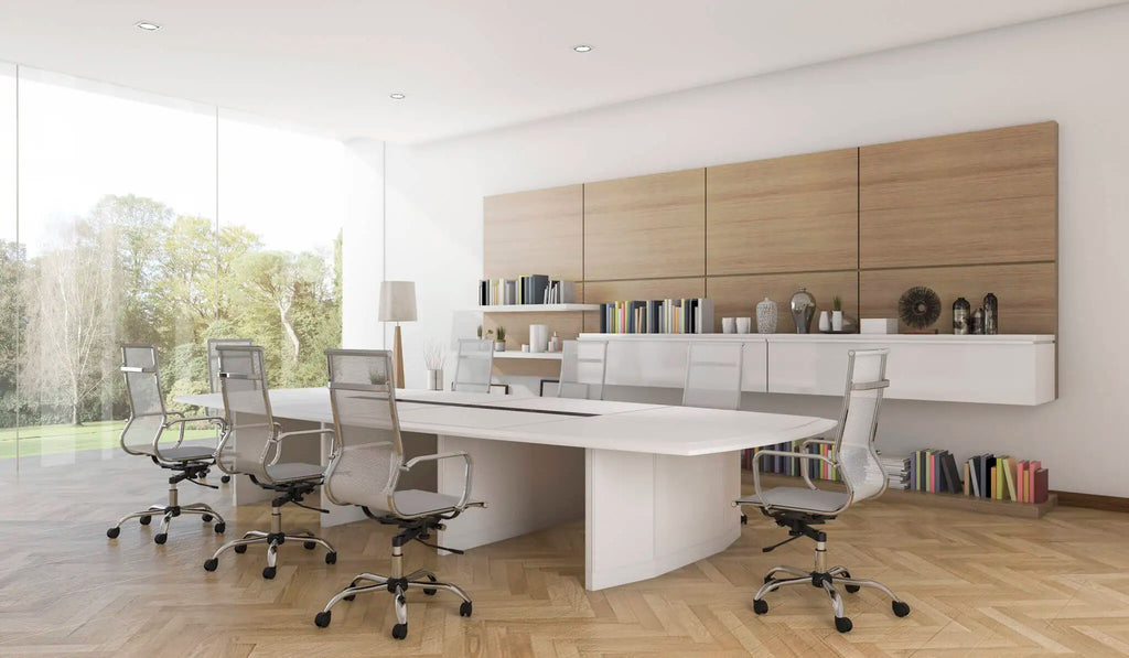 White office conference table with matching chairs and bookshelves